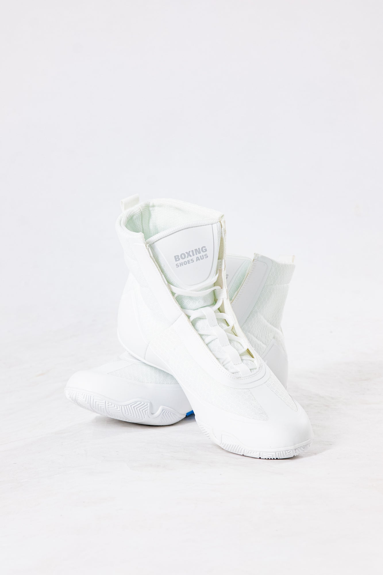 White high-top boxing shoes with 'Boxing Shoes Aus' branding on a white background