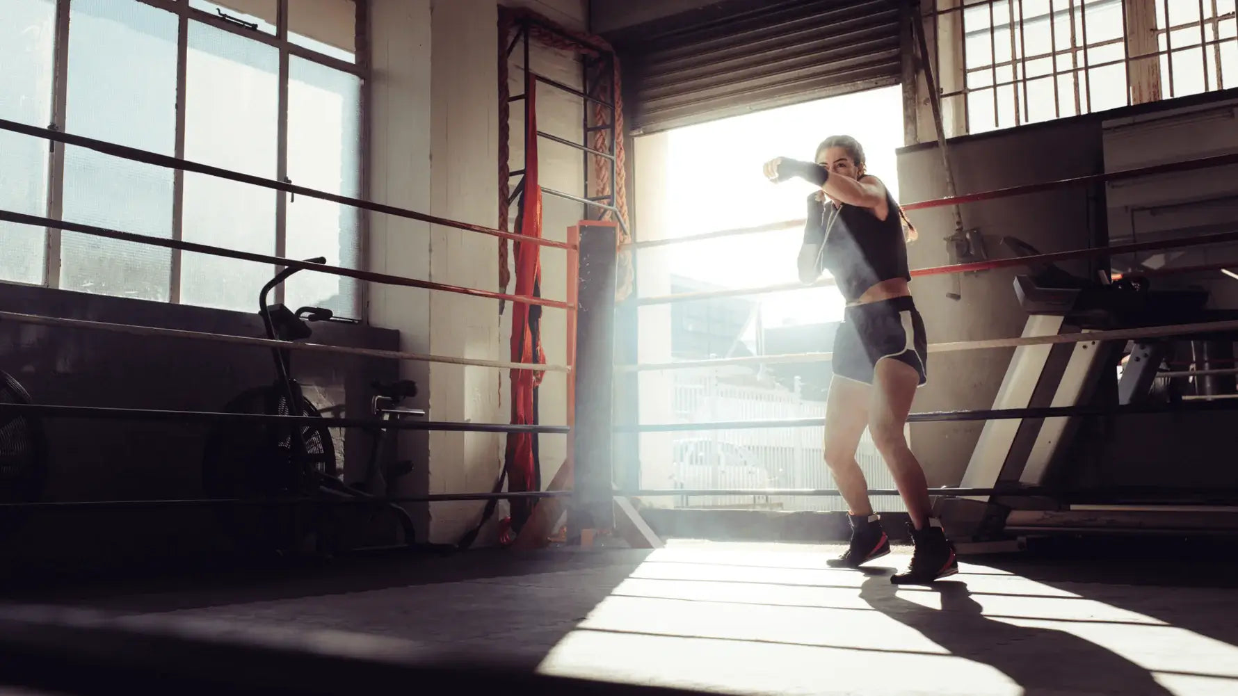 girl boxing in gym